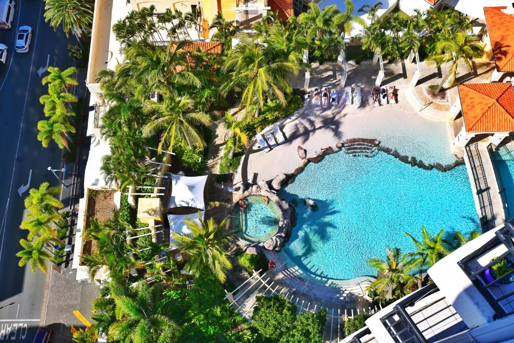 an overhead view of the pool at the resort at Stunning Apartment Best Ocean Views Surfers in Gold Coast