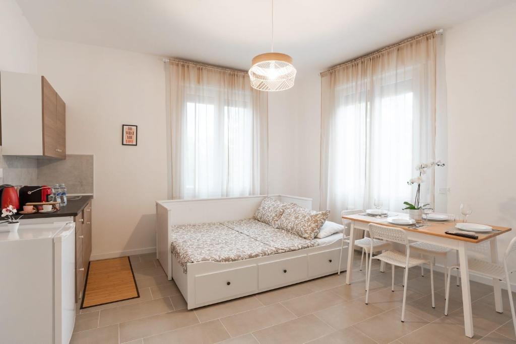 Postel nebo postele na pokoji v ubytování Mentana Guest House