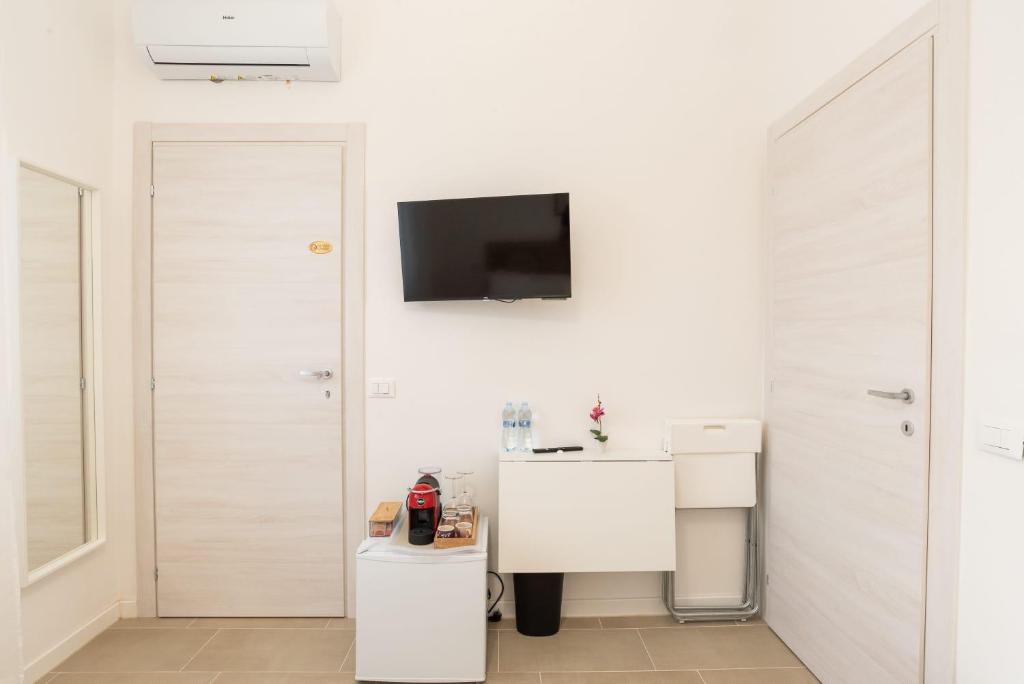 TV a/nebo společenská místnost v ubytování Mentana Guest House