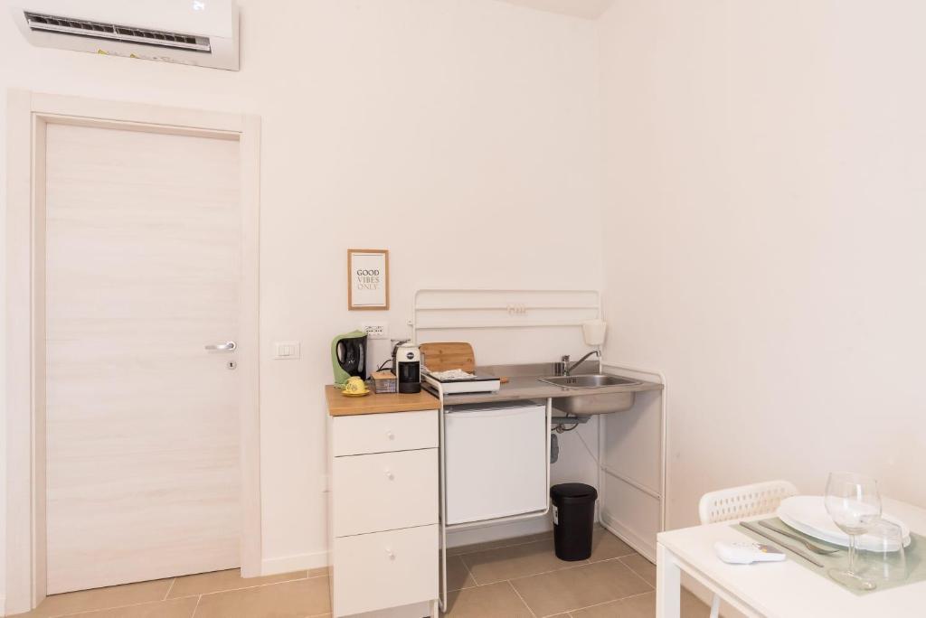Kuchyň nebo kuchyňský kout v ubytování Mentana Guest House