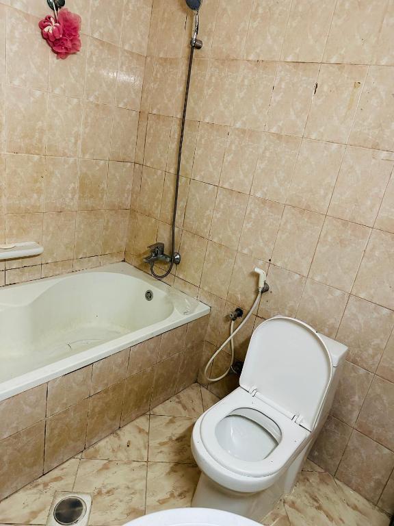 Ένα μπάνιο στο Elite Class Furnished Room