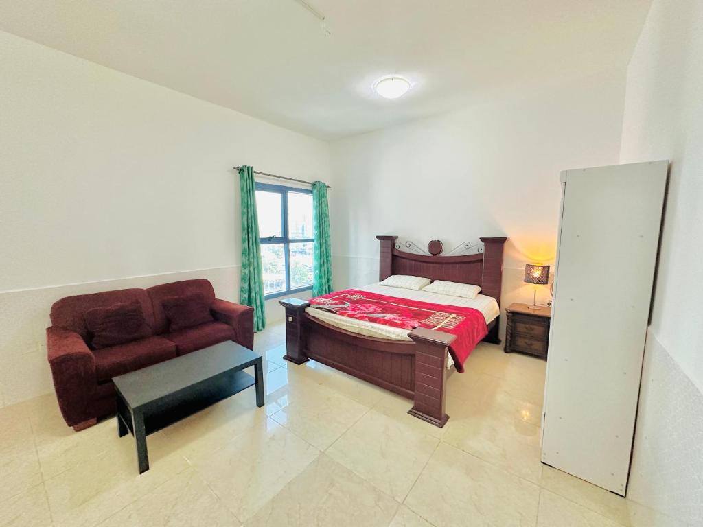 Ένα ή περισσότερα κρεβάτια σε δωμάτιο στο Elite Class Furnished Room