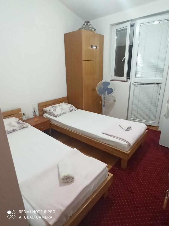 Postel nebo postele na pokoji v ubytování Anika apart