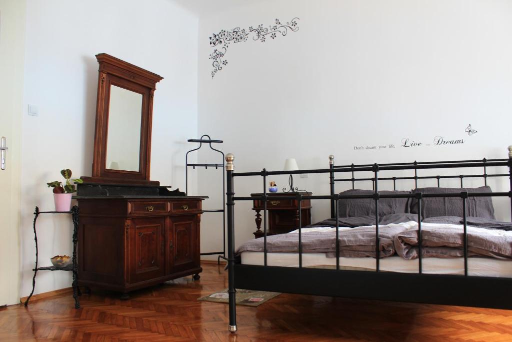 Postel nebo postele na pokoji v ubytování M&M Apartment