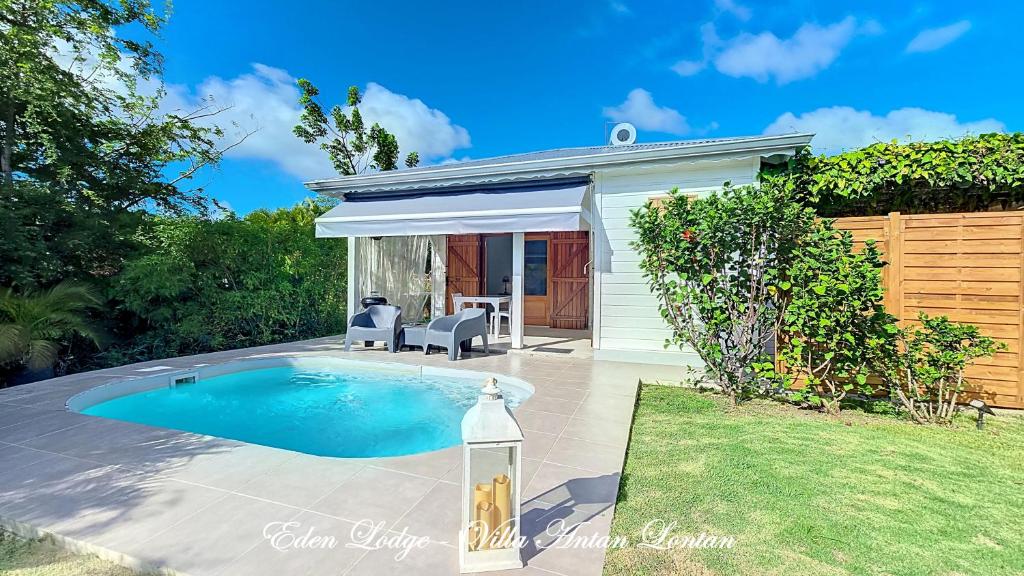 Bazén v ubytování Eden Lodge 4 Villas avec piscine privée nebo v jeho okolí