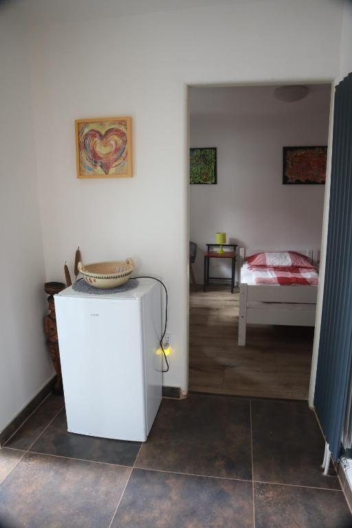 Postel nebo postele na pokoji v ubytování Tanzanit