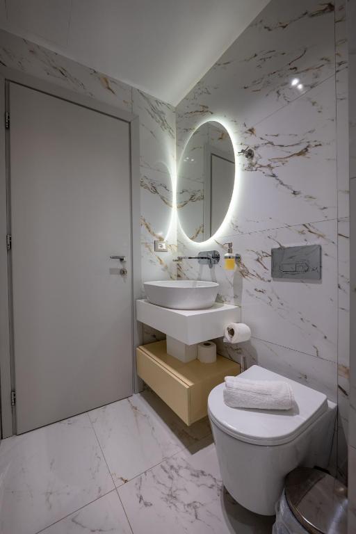 Koupelna v ubytování Norge Hotel
