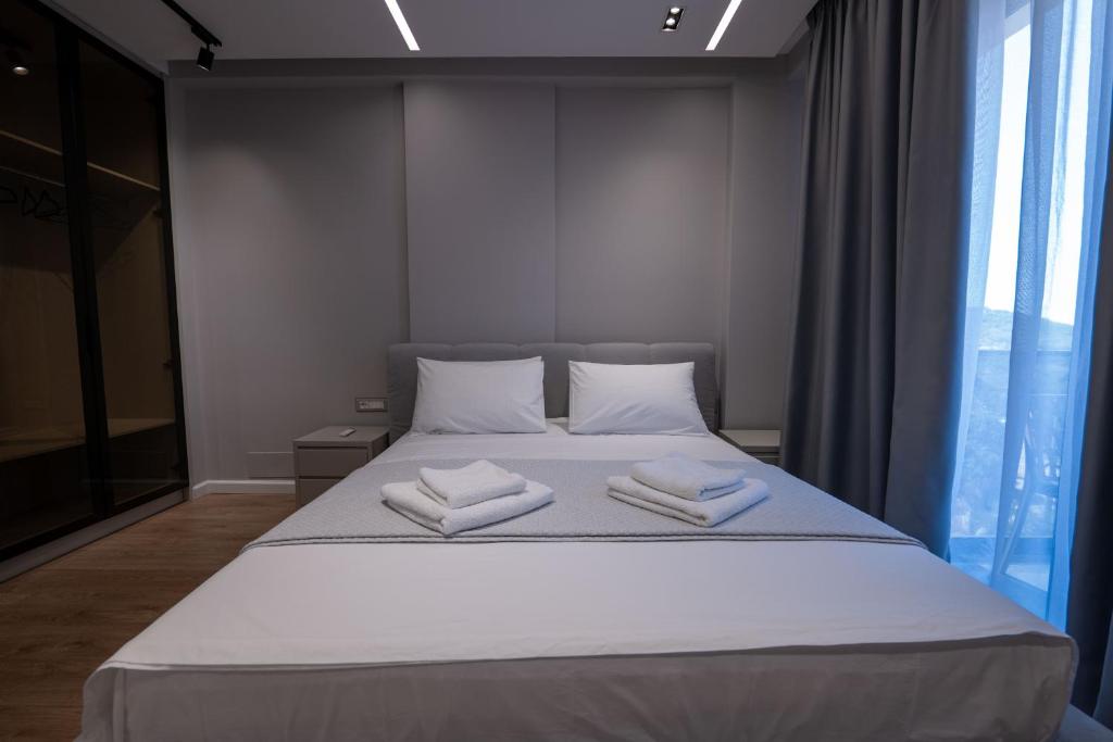 Postel nebo postele na pokoji v ubytování Norge Hotel