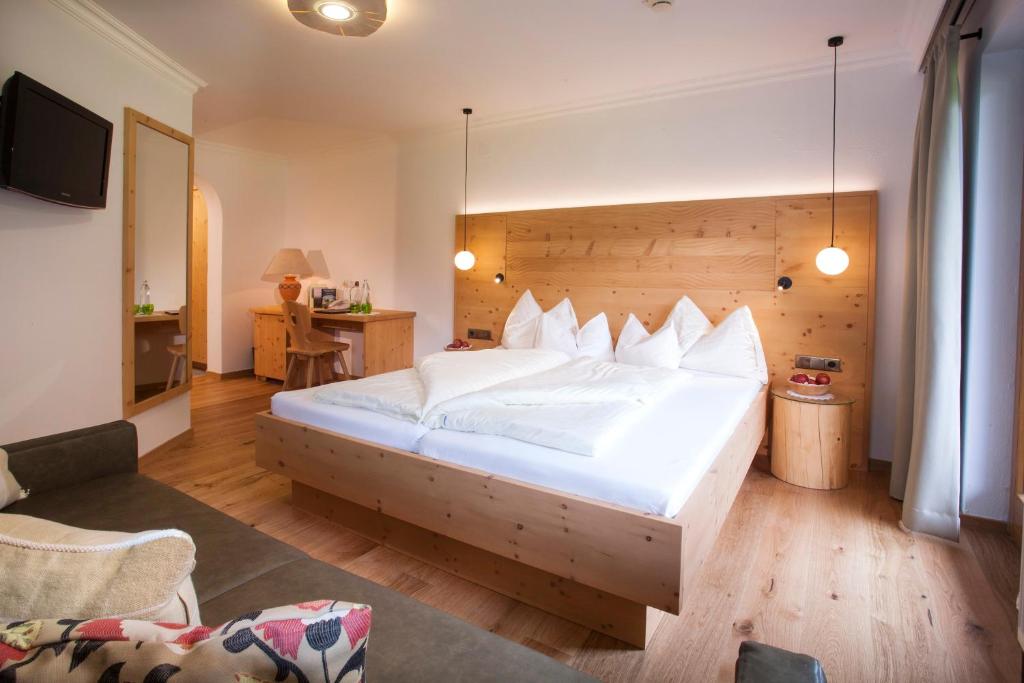 Posteľ alebo postele v izbe v ubytovaní Natur- & Wanderhotel Tuxertal