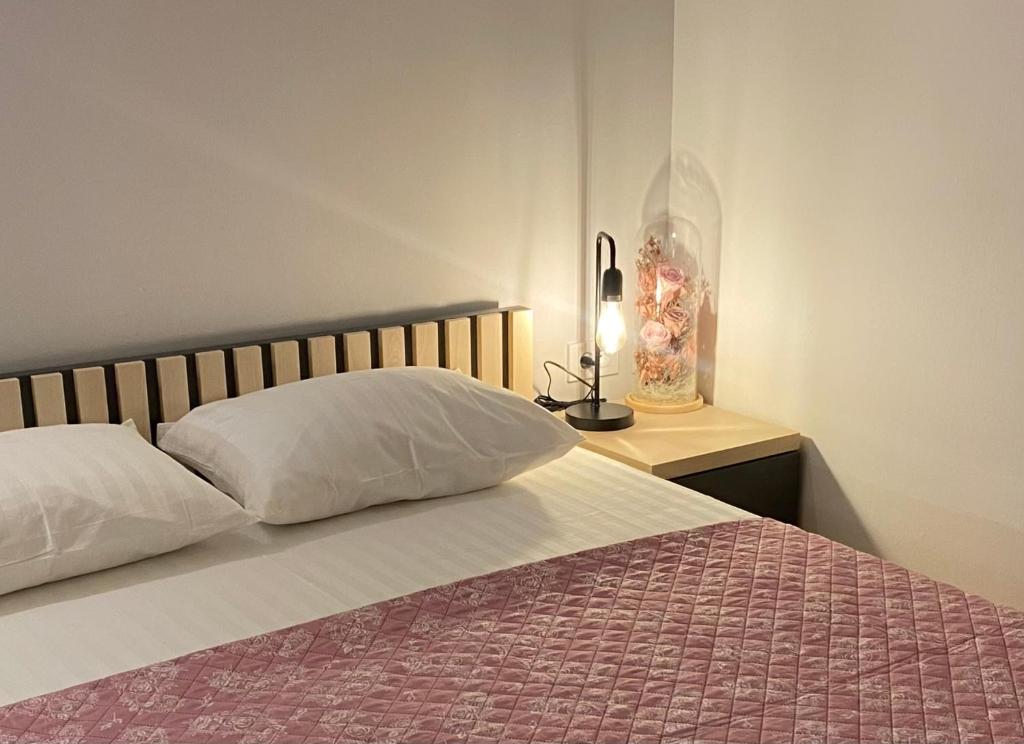 Ліжко або ліжка в номері Adzic Apartments