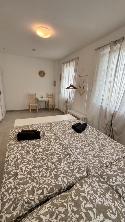 Postel nebo postele na pokoji v ubytování Langenzersdorf Apartment