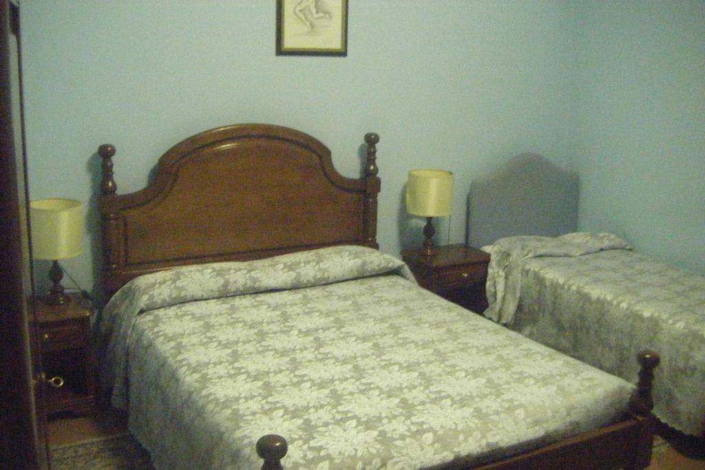 Postel nebo postele na pokoji v ubytování Hotel Nastro Azzurro