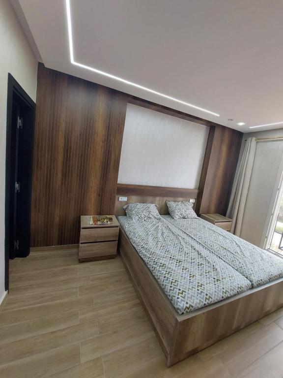 Postel nebo postele na pokoji v ubytování Fenêtre sur le paradis