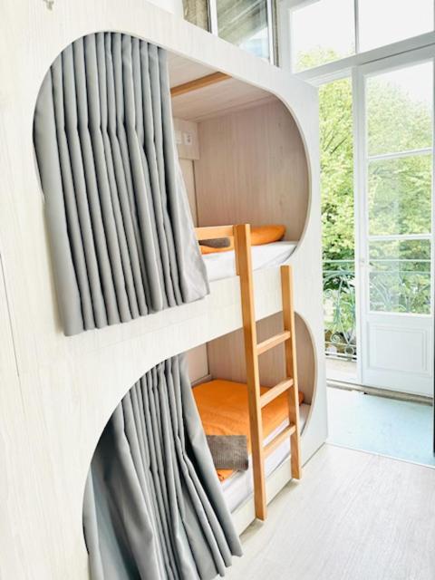 Postel nebo postele na pokoji v ubytování Fantasy Hostel Porto