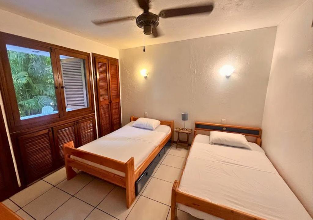 Postel nebo postele na pokoji v ubytování Hermosa casa frente a la playa
