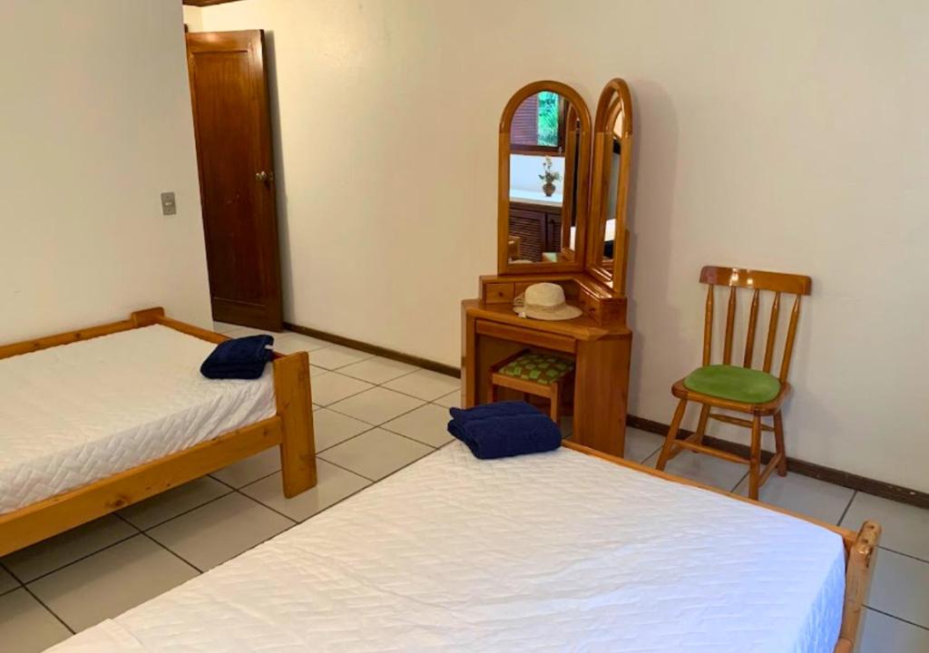 Postel nebo postele na pokoji v ubytování Hermosa casa frente a la playa