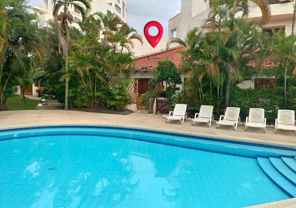 Bazén v ubytování Hermosa casa frente a la playa nebo v jeho okolí