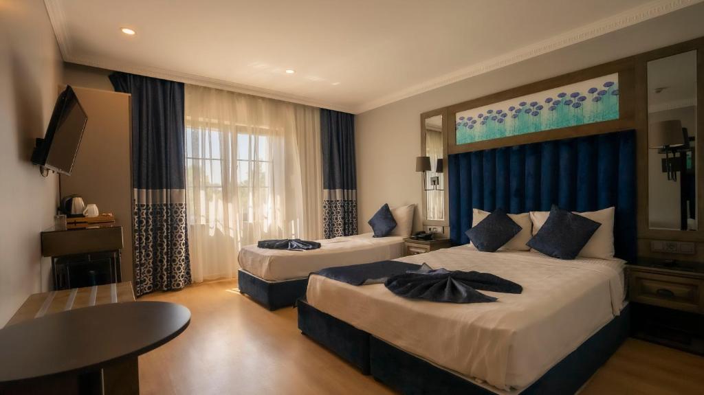Postel nebo postele na pokoji v ubytování Farina Hotel By Cigno