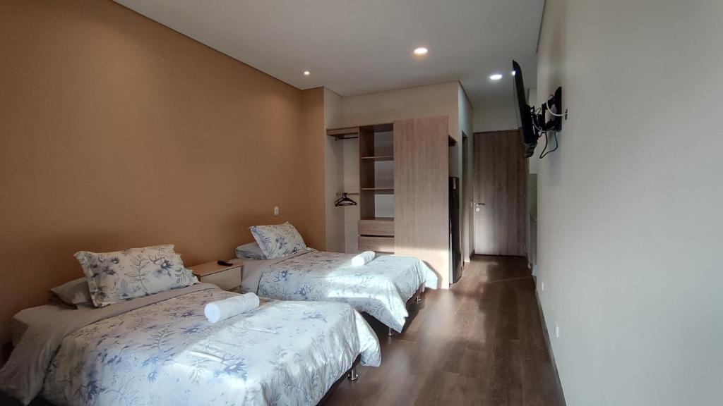 Postel nebo postele na pokoji v ubytování La Milla, Lofts