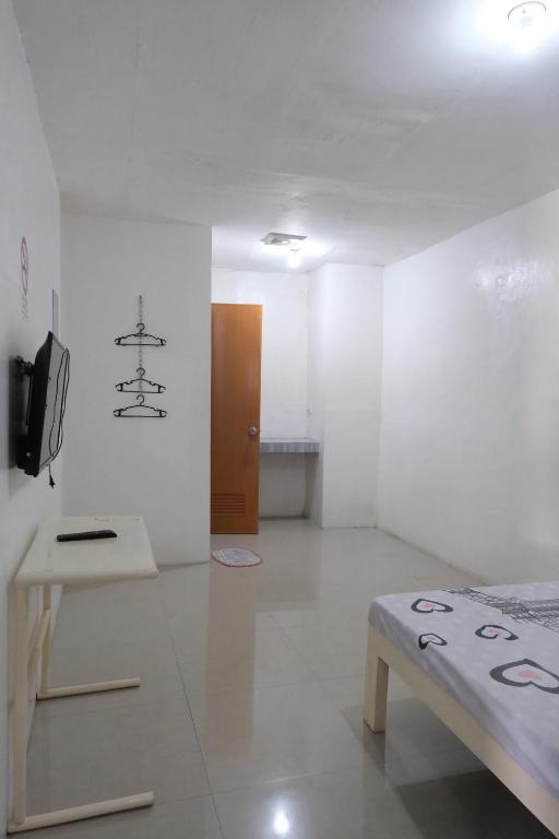 TV a/nebo společenská místnost v ubytování La Riesa Dorm
