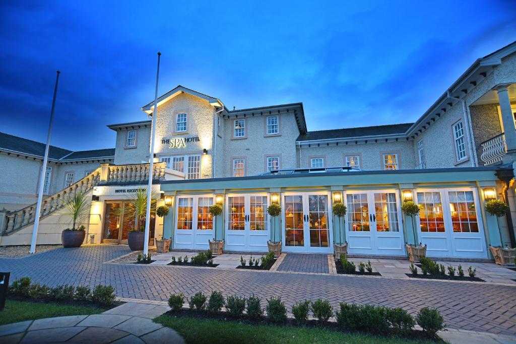 an exterior view of the inn at night at Spa Hotel at Ribby Hall Village in Wrea Green