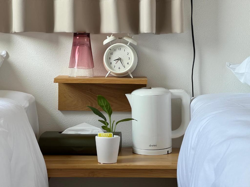 Postel nebo postele na pokoji v ubytování HOTEL WAN OSAKA EBISU