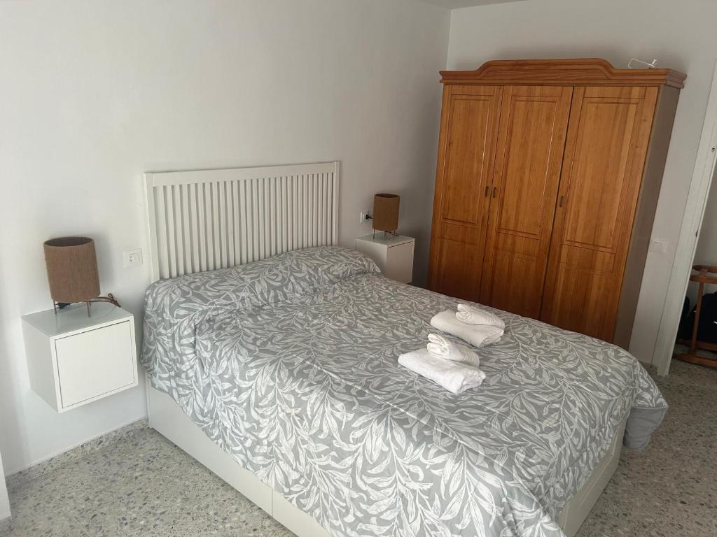 Giường trong phòng chung tại Horizonte azul