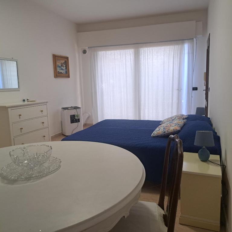 Postel nebo postele na pokoji v ubytování I delfini