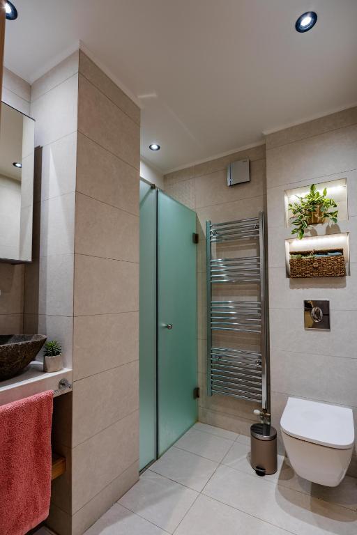 Koupelna v ubytování Evlalia home