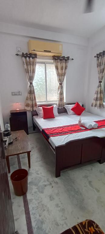 Postel nebo postele na pokoji v ubytování Regencyy Guest House