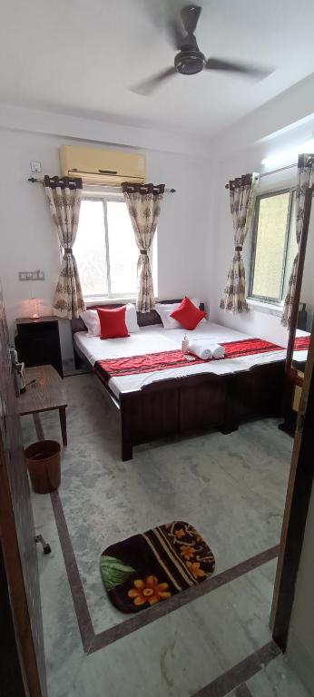 Postel nebo postele na pokoji v ubytování Regencyy Guest House