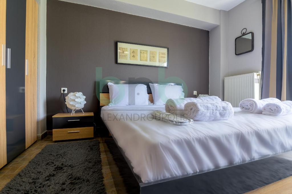 Кровать или кровати в номере Seaside Apartment