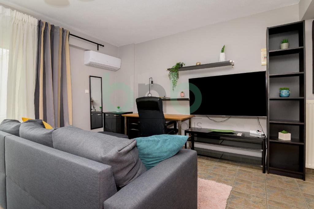 Телевизор и/или развлекательный центр в Seaside Apartment