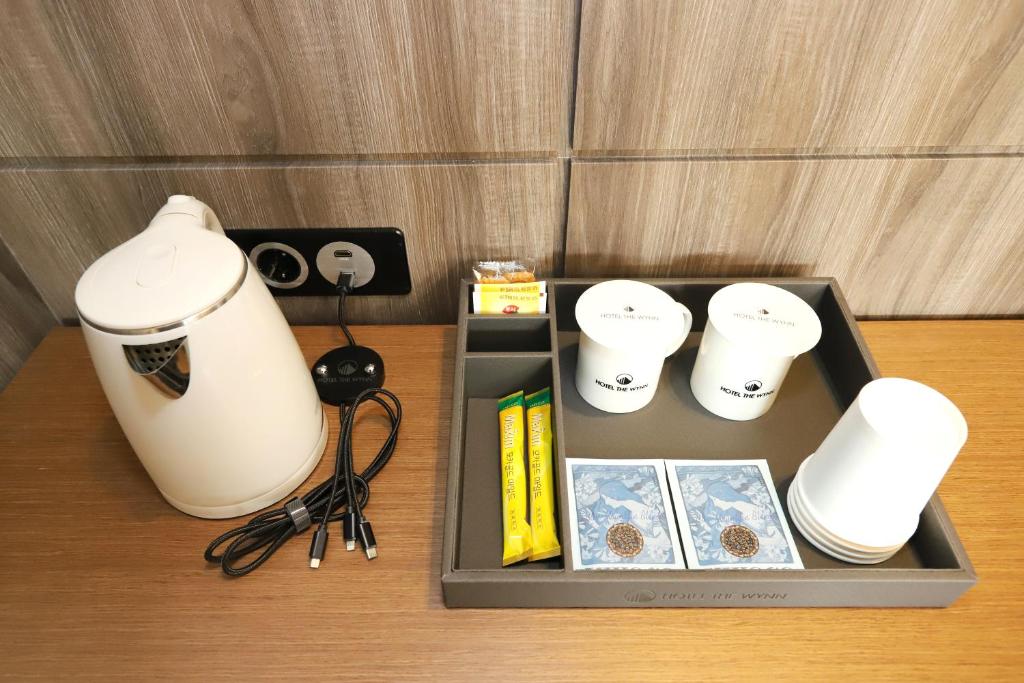 Příslušenství pro přípravu čaje a kávy v ubytování Hotel The Wynn