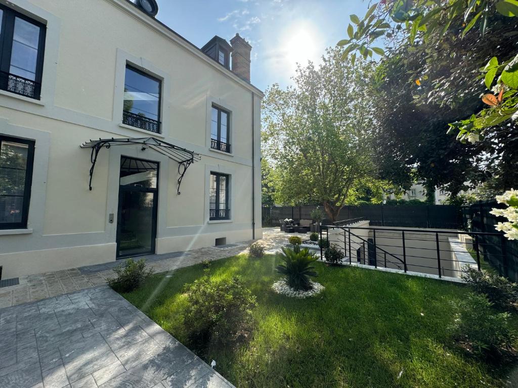 Κήπος έξω από το L'étoile de Seine 77 Appartement 4