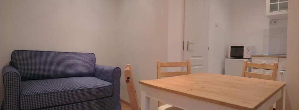 Televízia a/alebo spoločenská miestnosť v ubytovaní Apartman 4 You Westend