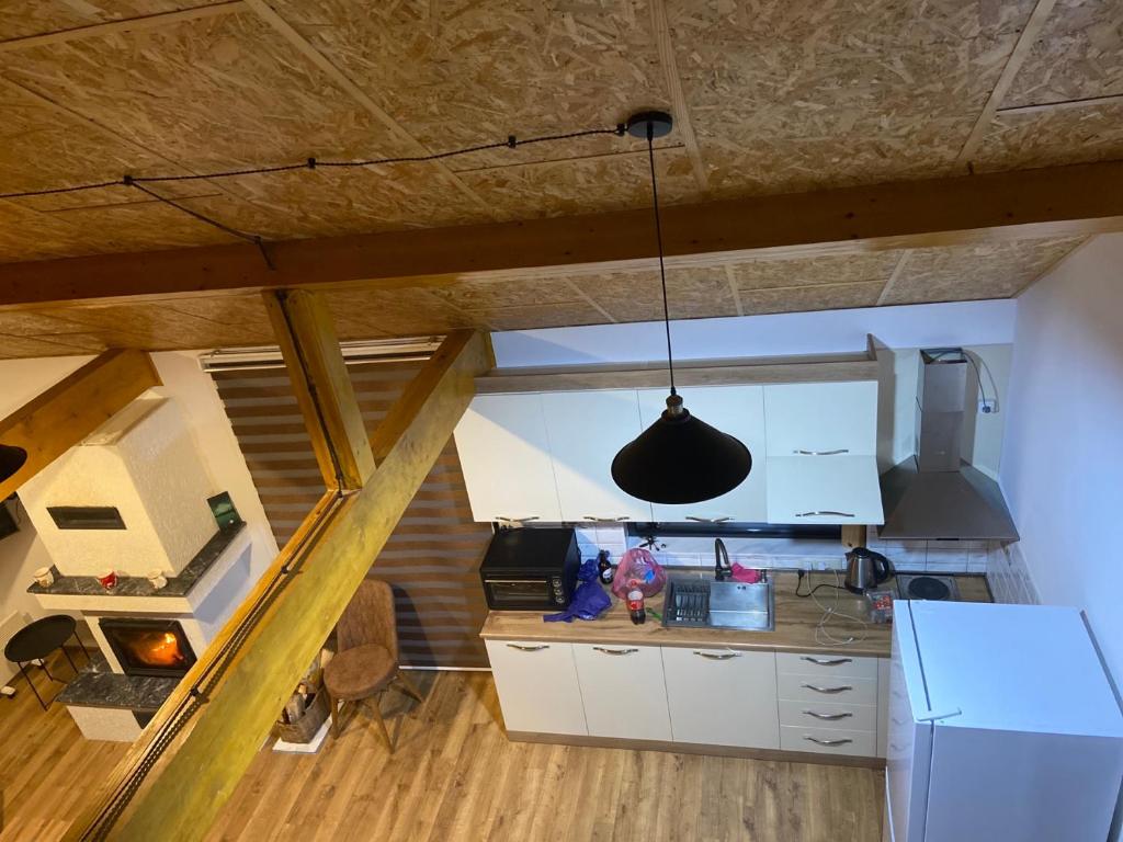 Kuchyň nebo kuchyňský kout v ubytování Kokhta Villa In Bakuriani