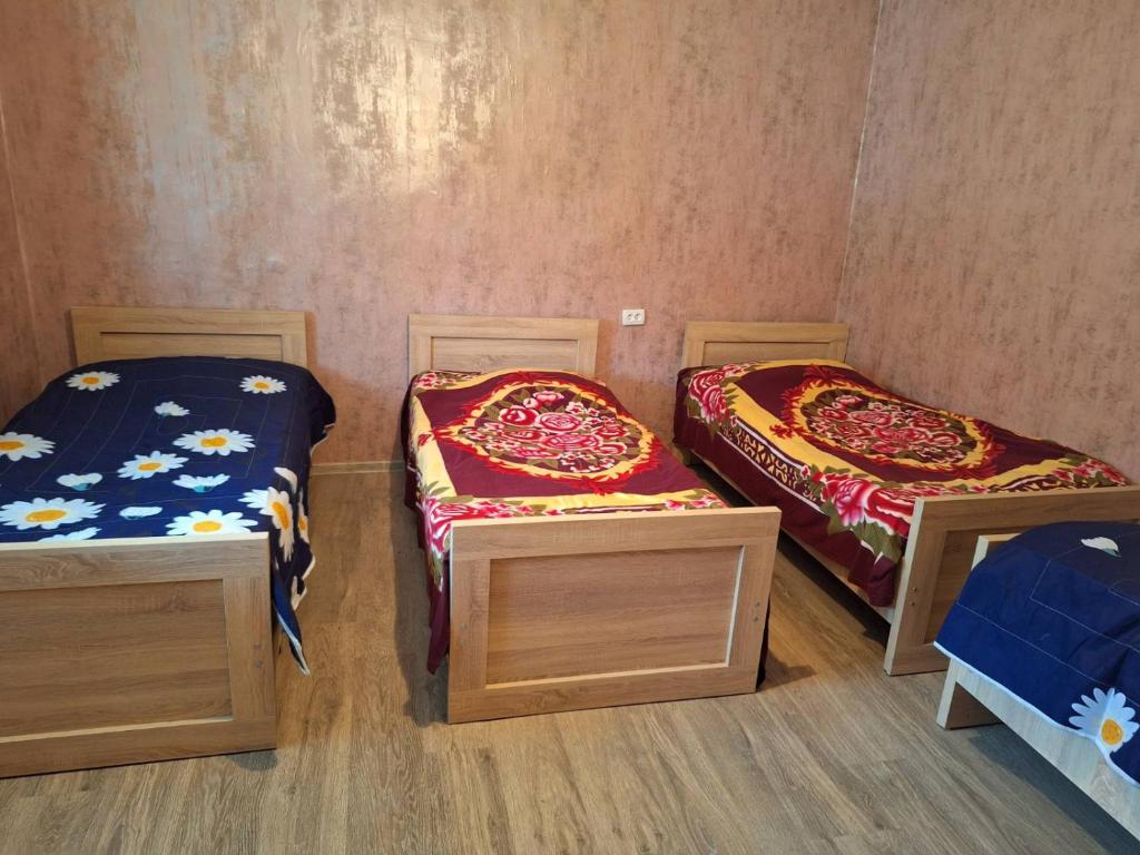 Postel nebo postele na pokoji v ubytování Guest House Gvidani