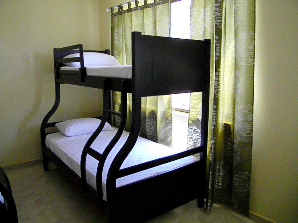 Postel nebo postele na pokoji v ubytování Hotel Marvento II