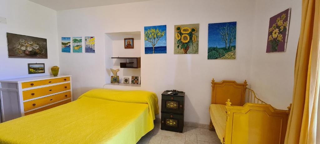 Postel nebo postele na pokoji v ubytování La Limonaia a mare