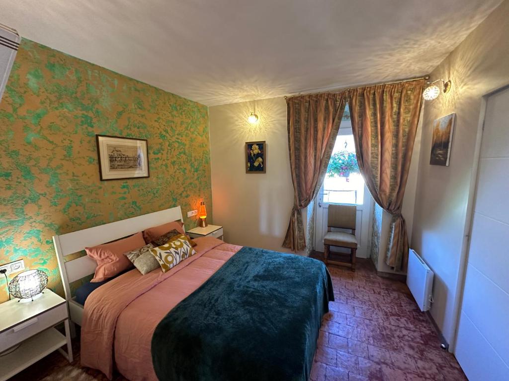 Кровать или кровати в номере Le Lodge de Serenite