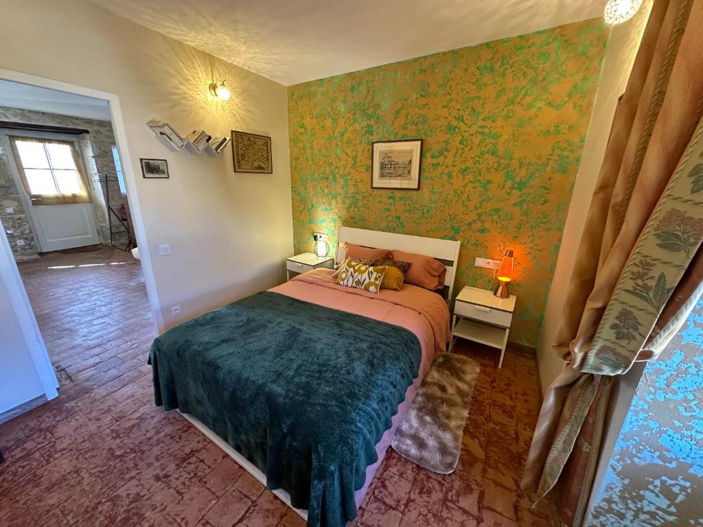 Кровать или кровати в номере Le Lodge de Serenite