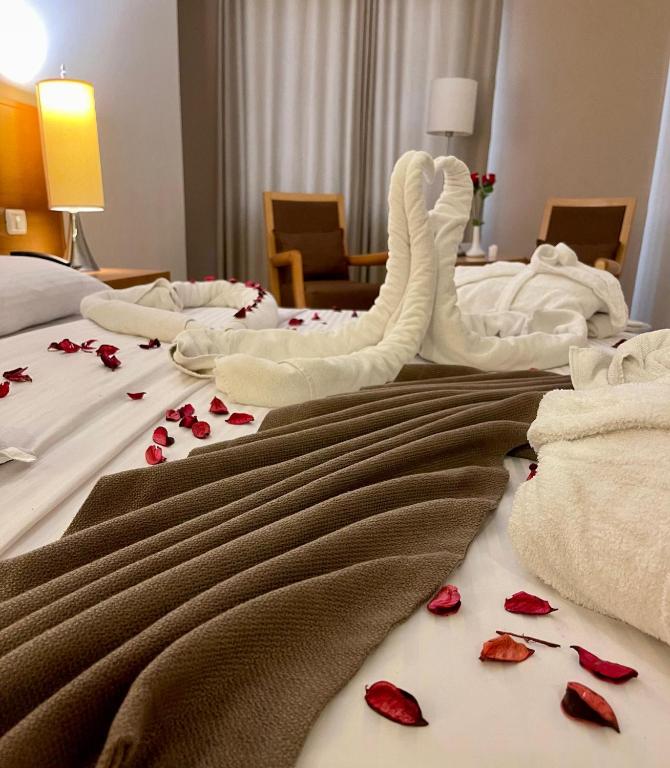 Postel nebo postele na pokoji v ubytování Caesar Hotel Ramallah