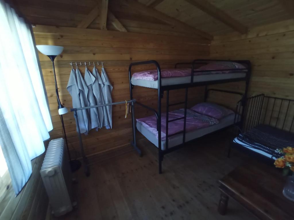 Postel nebo postele na pokoji v ubytování Nový kemp Slezské Pavlovice