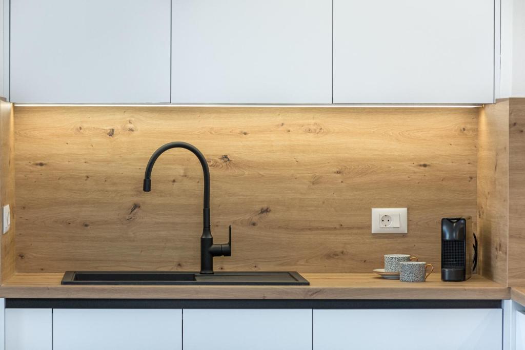 Kuchyň nebo kuchyňský kout v ubytování Skyline Suite