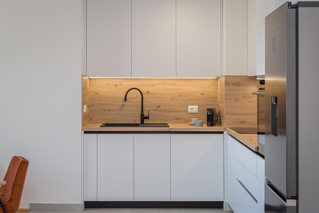 Kuchyň nebo kuchyňský kout v ubytování Skyline Suite