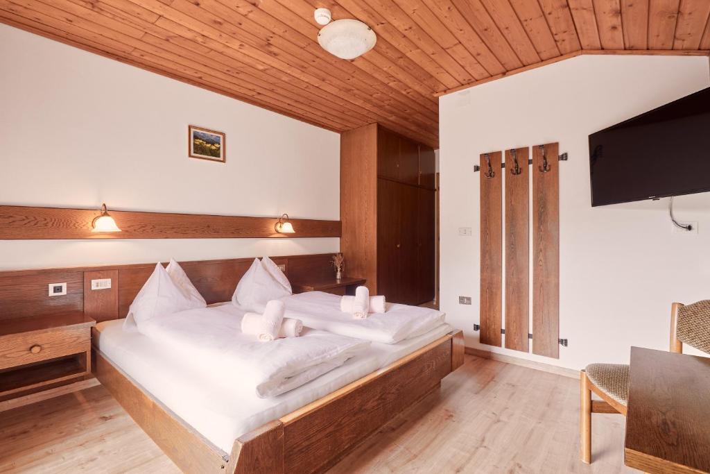 Postel nebo postele na pokoji v ubytování Ferienpension Zummüllerhof