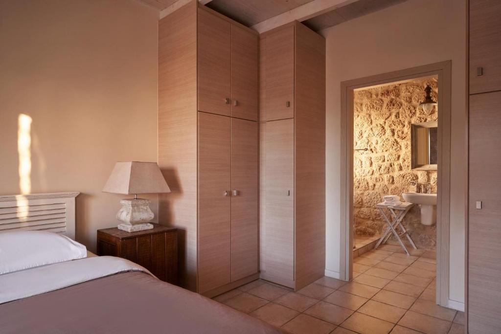 Postel nebo postele na pokoji v ubytování Riglia Villas