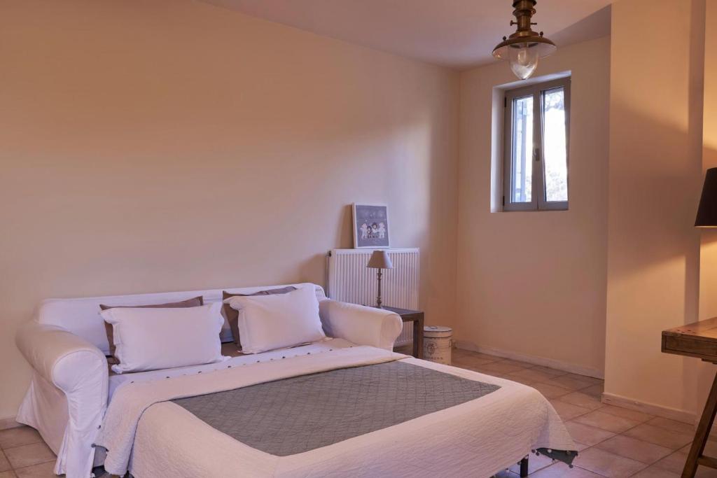 Postel nebo postele na pokoji v ubytování Riglia Villas