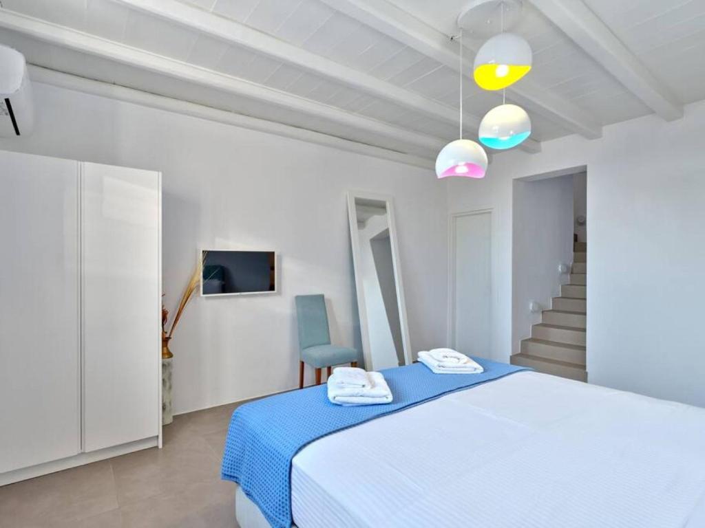 Posteľ alebo postele v izbe v ubytovaní La Vitalite Luxury Villa Mer in Paros